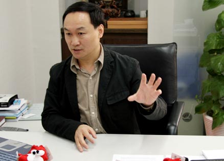 专访中国服装设计师协会主席王庆